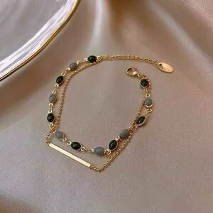 Elegant Dark Grey and Gold Double Chain Bracelet